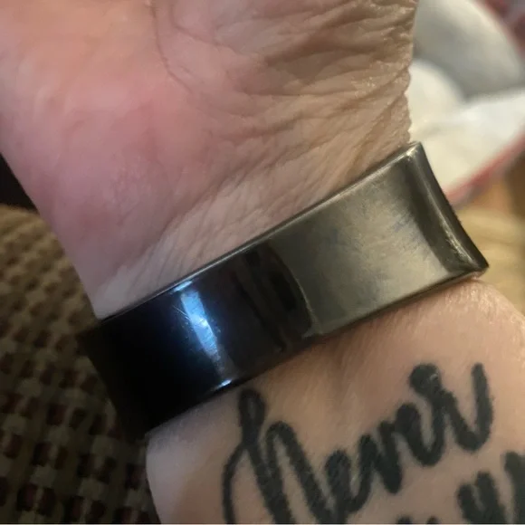 Relativity hinged cuff bracelets with large green stones. - Picture 2 of 3